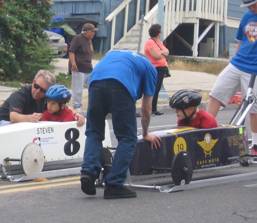 Two competitors get some last minute advice.