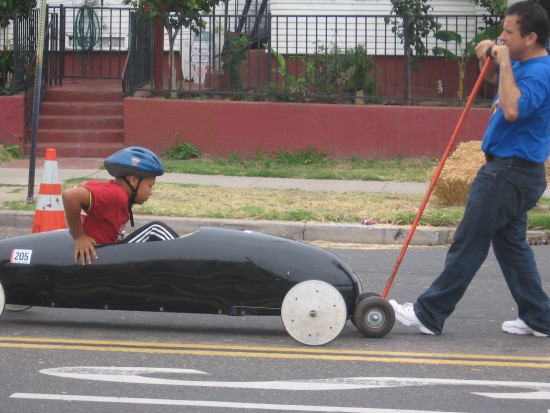 One race is over and a car is retrieved.