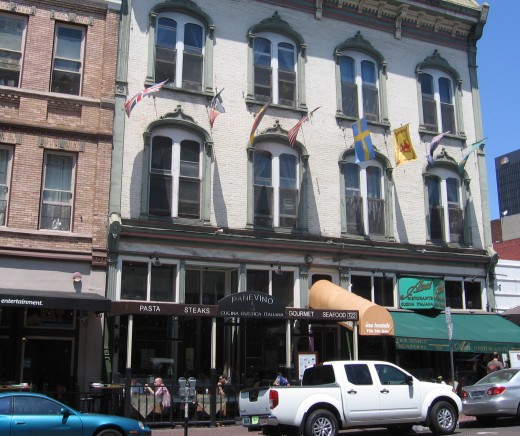 People dine at restaurant in old Gaslamp building.