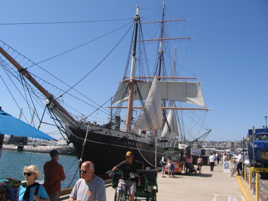 People out for a stroll by the Star of India.