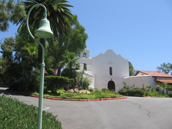 El Camino Real bell in front of California's first Spanish mission.