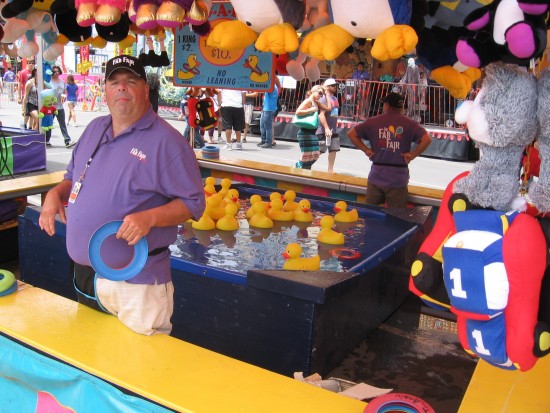 Persuasive carny almost convinces me to throw ring at duck.