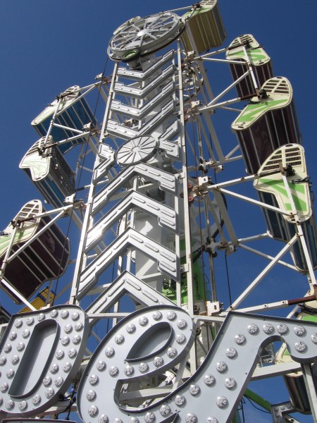 Gazing up at ride in San Diego County Fair's Fun Zone.
