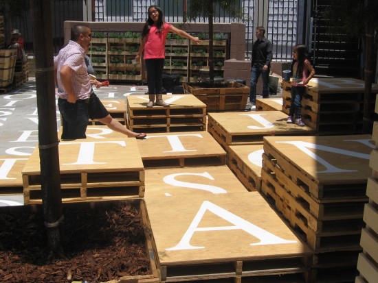 People enjoy new cozy, creative urban park.