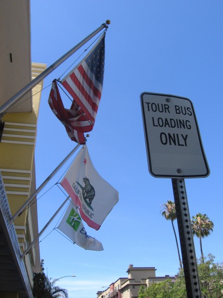 Tangled flag hangs in front of San Diego hotel.