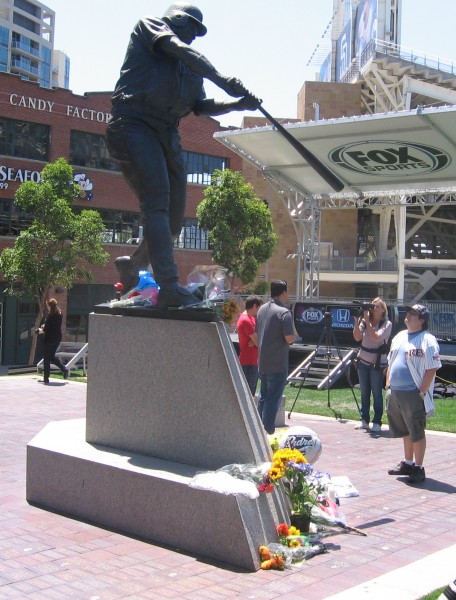 Flowers decorate the base of Tony Gwynn statue.