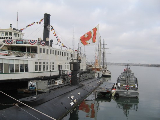 Big Tony Gwynn flag flies above tall ship America at Maritime Museum.