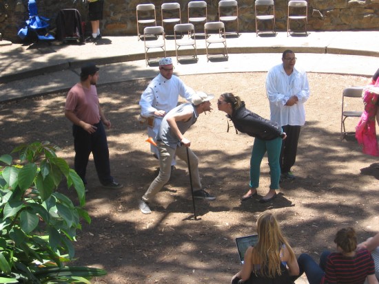 Actors rehearse A Nation of Pain in Balboa Park's small Zoro Garden.