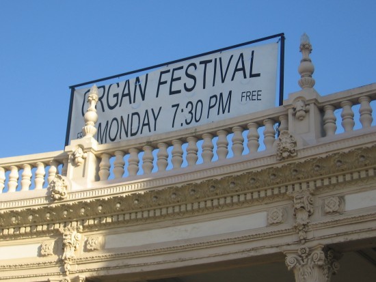 Big banner on Organ Pavilion's colonnade announces the event.