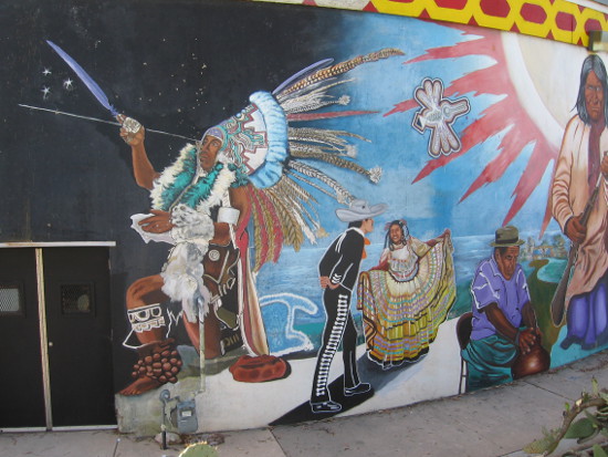 Diverse images from Latino culture in the large mural.