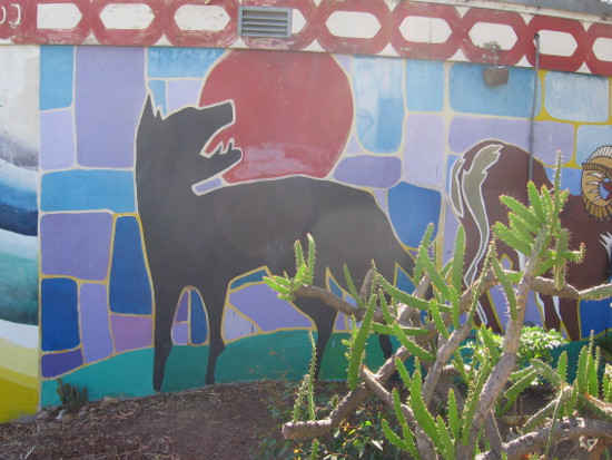 Colorful mural contains many animals from the Americas.