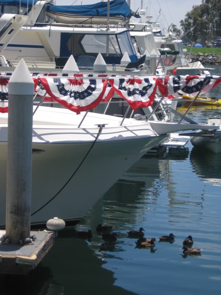 Boat decked with Fourth of July bunting.