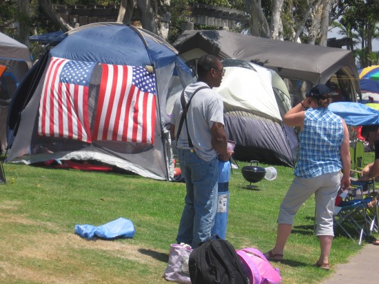 The bayfront parks are crowded with tents and celebrating Americans.