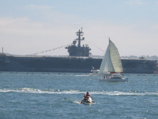 USS Carl Vinson aircraft carrier strung with festive colors.