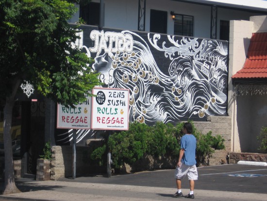 Another tattoo parlor embellished with urban art.