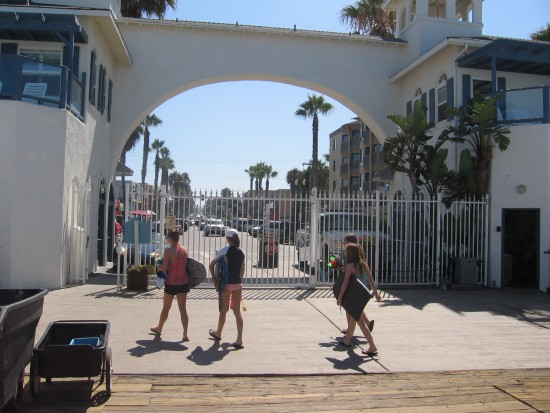 Leaving Crystal Pier, to walk down the Pacific Beach boardwalk.