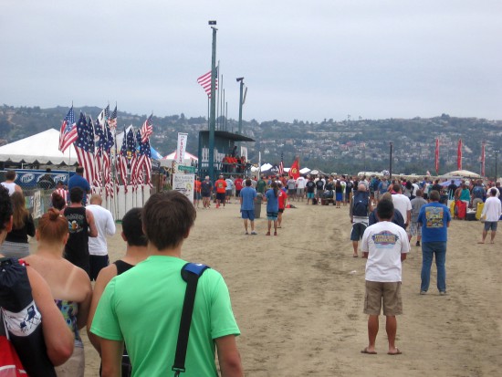 People stand as day begins with the national anthem.