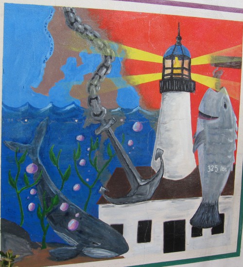 Point Loma lighthouse shines over Pacific Ocean.