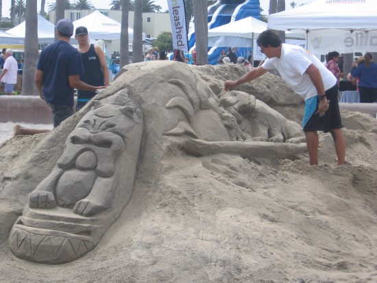 Finishing touches put on a sand sculpture at Imperial Beach.