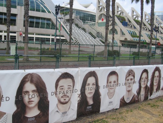 Several long banners with faces advertise The Leftovers on HBO.
