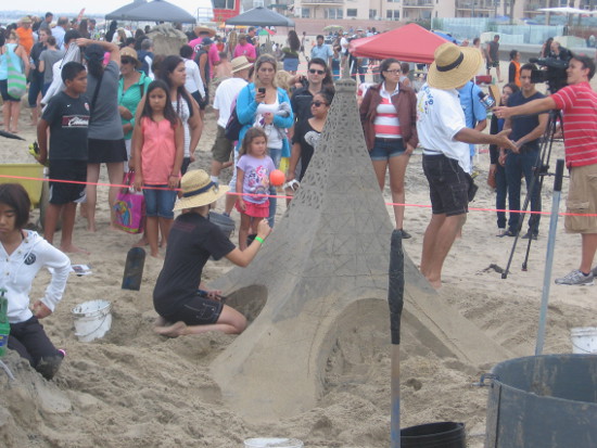 Tall structure looks like an exaggerated Eiffel Tower.