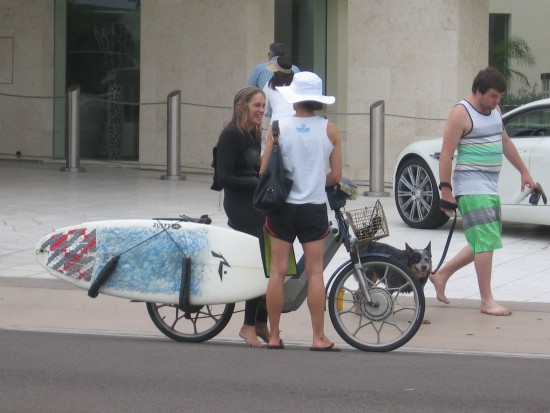 Cool surfboard rack on a bicycle near the beach!