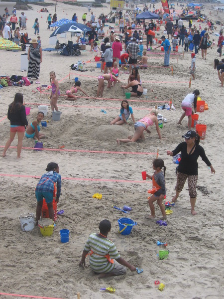 Kids on the pier's other side build castles, too!