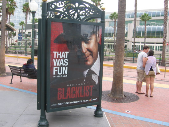 Poster by trolley station promotes another season of Blacklist.
