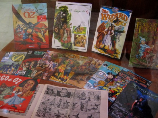 Oz collectibles and artifacts in many languages on display.