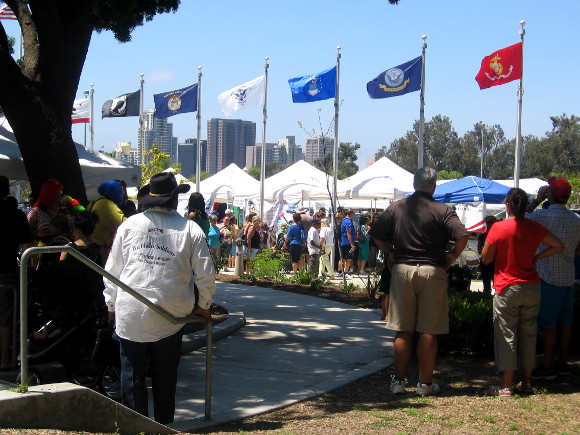Now I'm standing in back area where chairs were under shady trees.