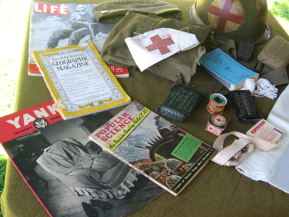 Scattered items inside a command tent include old magazines.