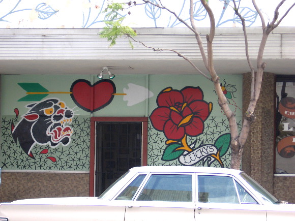 Bold graphics on wall of Lucky's tattoo parlor.