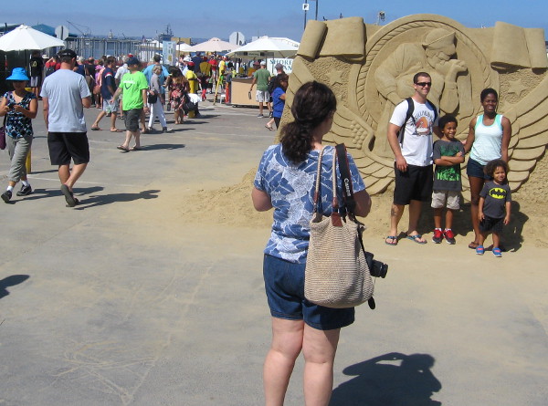 People arrive at the 2014 US Sand Sculpting Challenge and 3D Art Expo in San Diego.