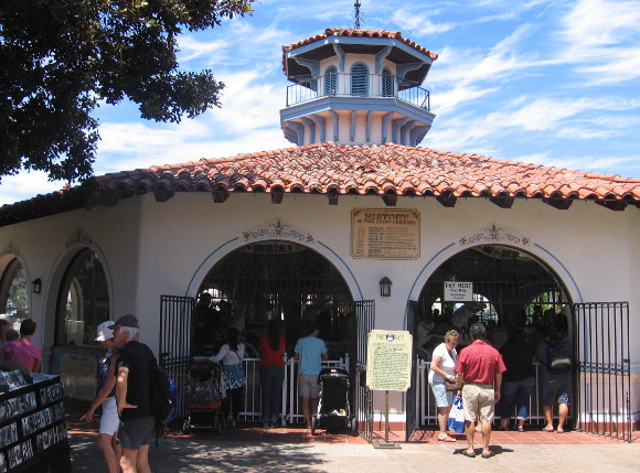 People enjoy a perfect day near the Seaport Village carousel.