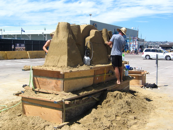 Sand sculpture is prepared in front of San Diego's Cruise Ship Terminal.