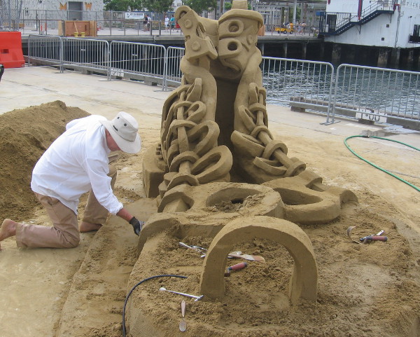 The master sand artists all work very carefully as big festival begins.