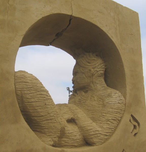 A close photo of some very fine work by a sand sculpting master.