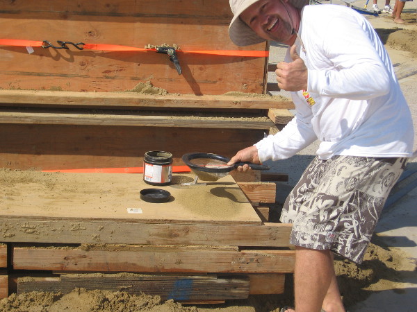 This funny dude sifting sand said he hadn't found gold yet!