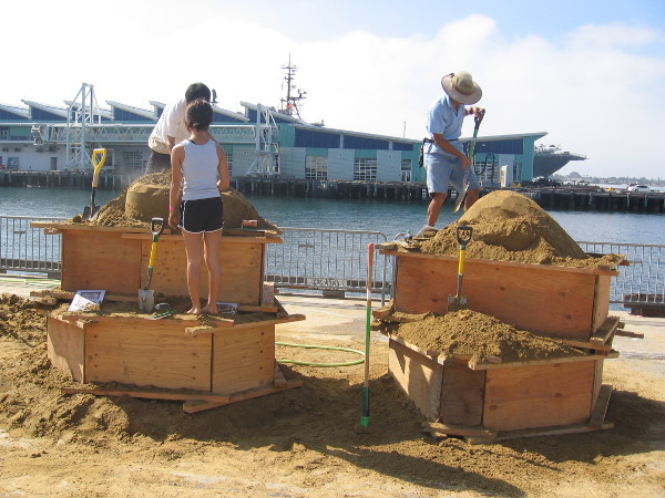 These sand heaps will be two demons cast into heaven by Buddha.