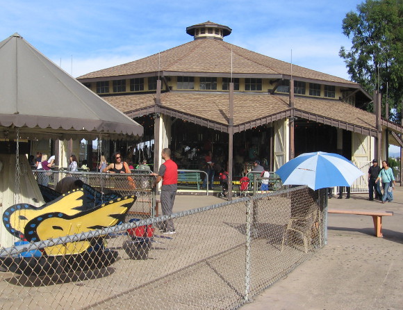 Another view past a ride for very young children.