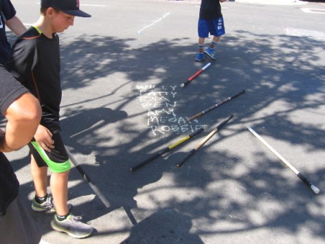 Players gather for some fun on a Saturday in downtown's Little Italy.