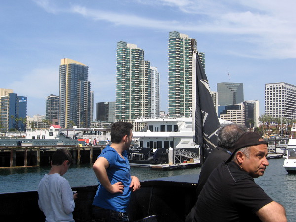 A view of downtown and harbor cruise ships from approaching ferry.
