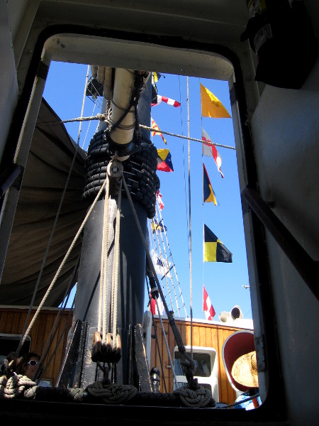 Coming up from below. Flags flap in the sunshine.