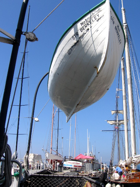 Passing under a lifeboat, heading to the dock at rear of the Berkeley.