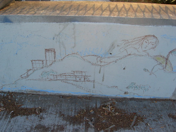 Sketch of female face and buildings on Sixth Avenue bridge above Interstate 5.