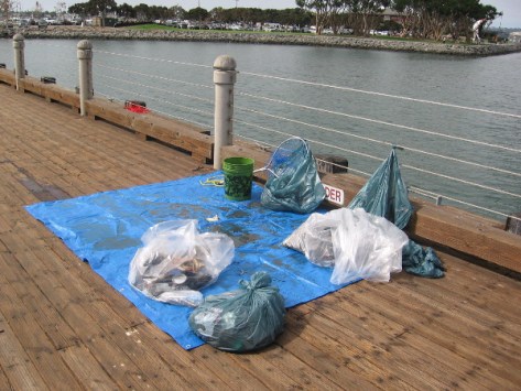 Bags of garbage were gathered throughout the morning to be hauled away later.