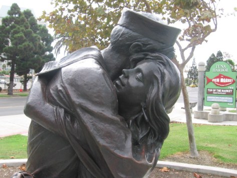 Love and thankfulness depicted on face of a Navy wife.