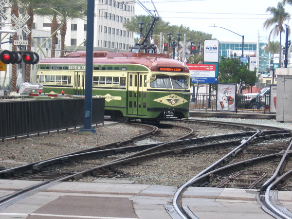 Here comes the San Diego Trolley's cool Silver Line, approaching America Plaza!
