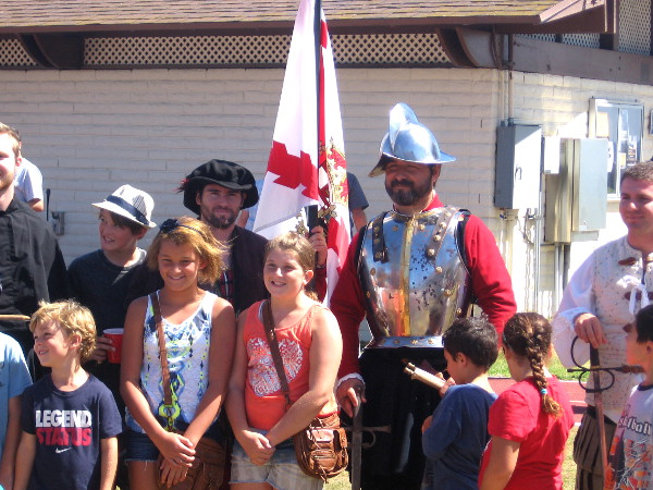 Kids pose with a modern day version of Juan Rodriguez Cabrillo.