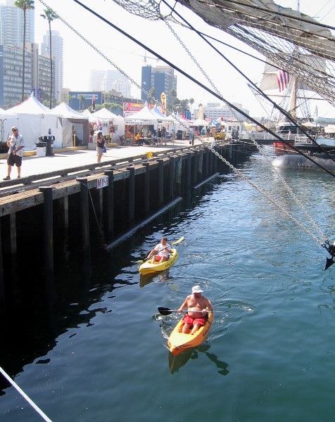 Kayakers were out cruising among the assembled tall ships.